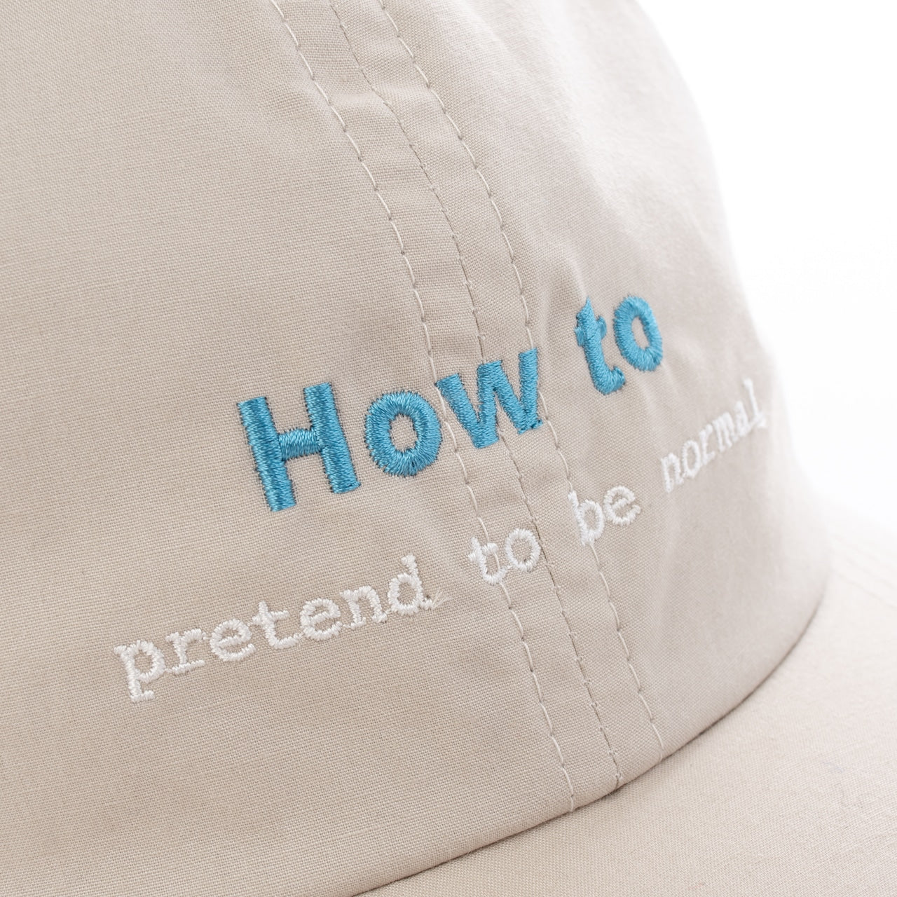 NEGATIVE MESSAGE CAP(BEIGE)